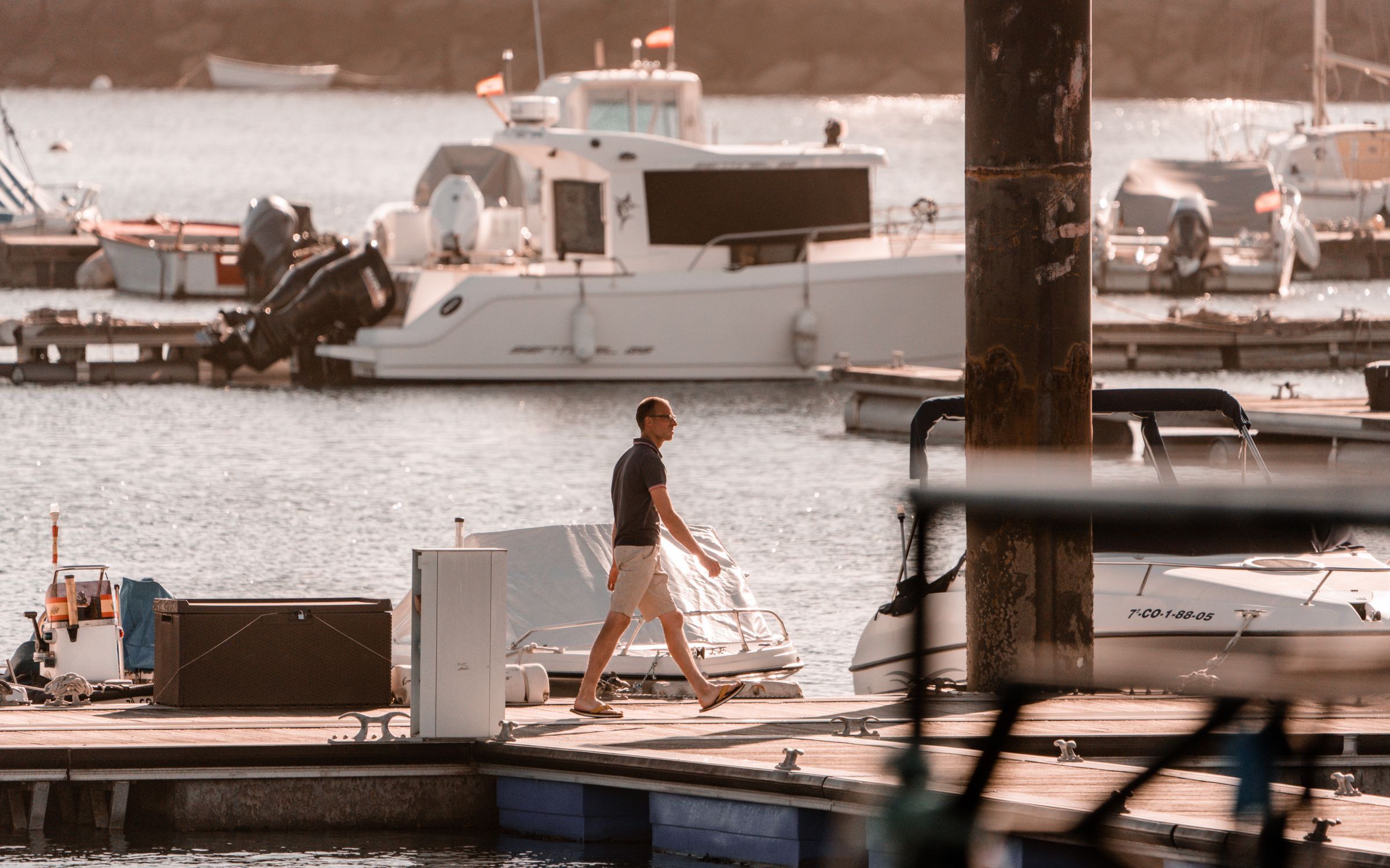 Dealer walking a marina dock for service
